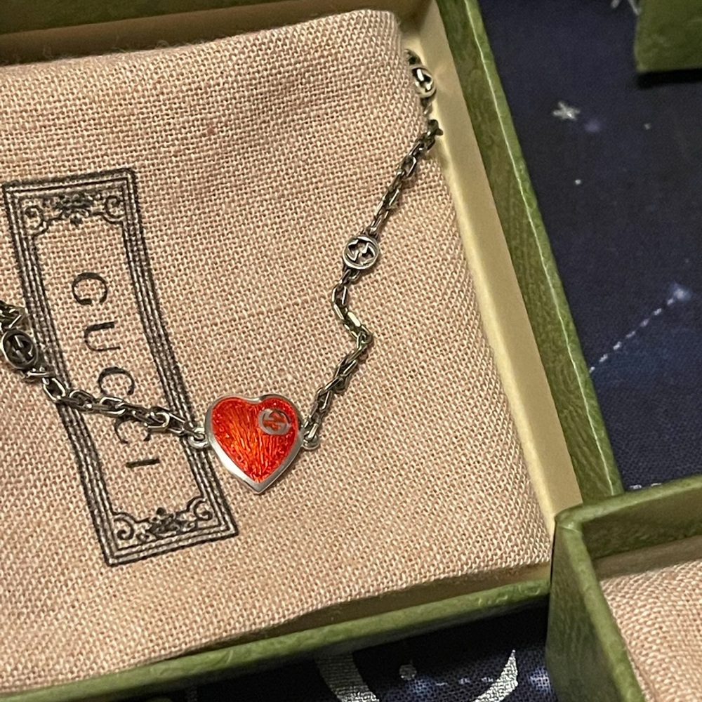 Authentic Gucci Heart bracelet with
Interlocking G